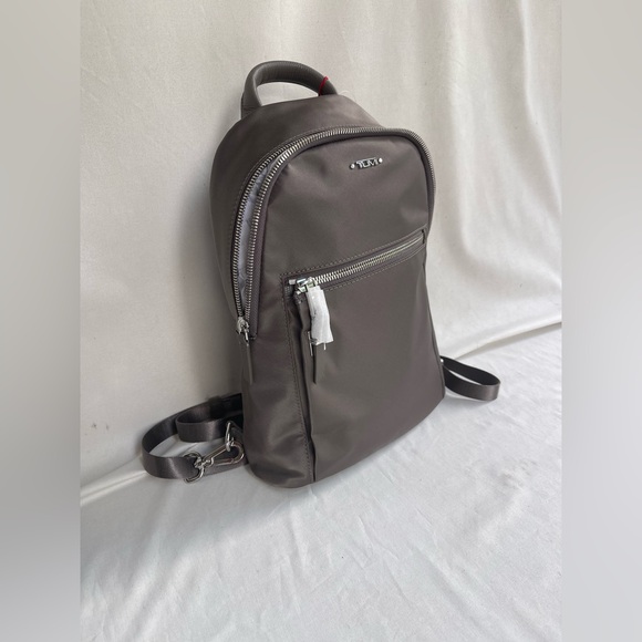 tumi backpack silver Alpha Bravo Navigation Khaki The TUMI Voyageur Celina Backpack in the color Thyme is a versatile travel and everyday backpack designed for organization and durability Tumi Gray Backpack with Silver